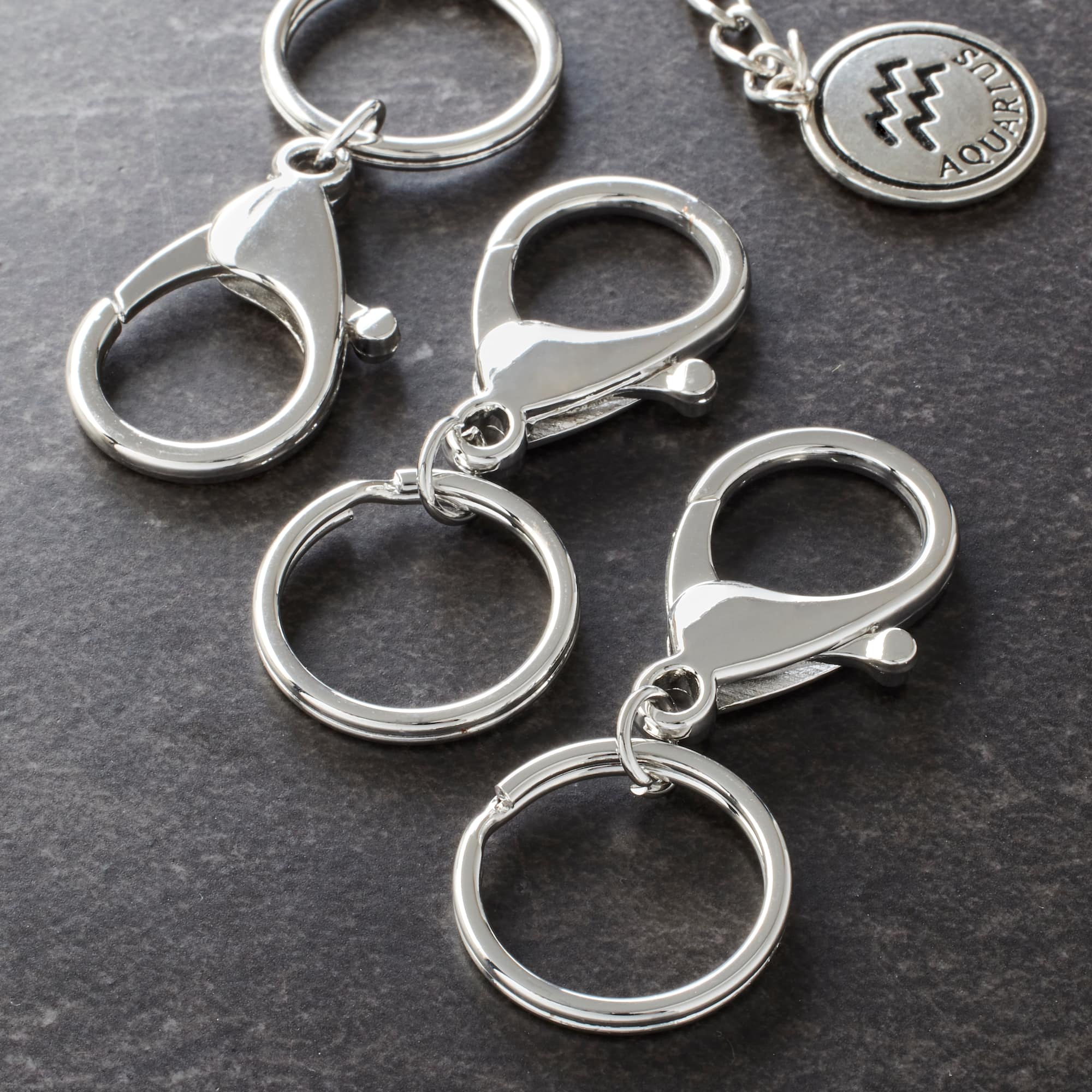 9 Packs: 3 ct. (27 total) Premium Rhodium Metal Keyring Lobsters by Bead Landing™